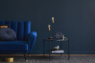 Image of Blue Sofa on a dar background 